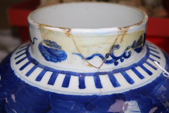 A Chinese blue and white prunus pattern vase and cover, Kangxi mark, 47cms (a.f.)